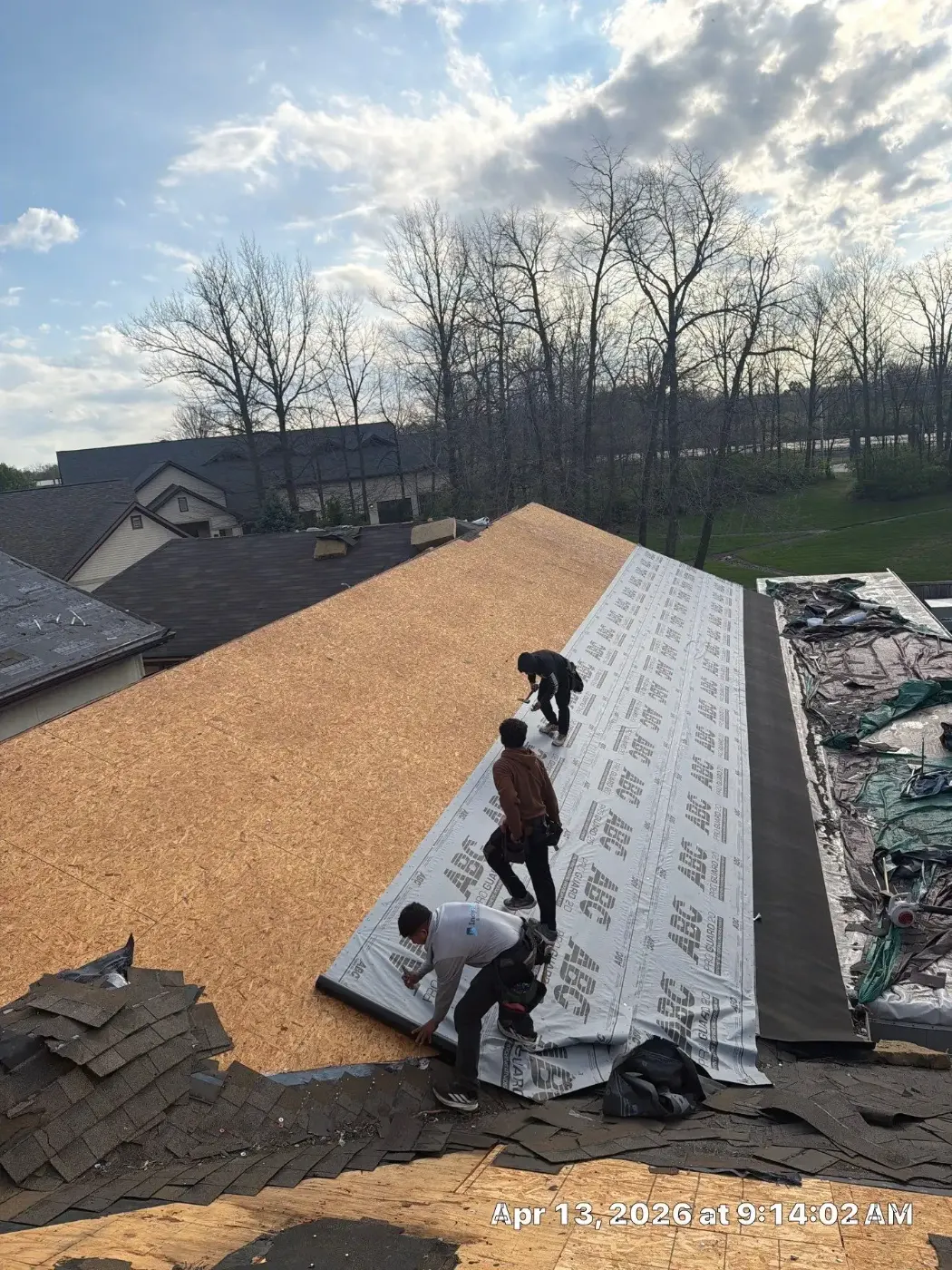 Tarping and dry-in on a Flora commercial roof